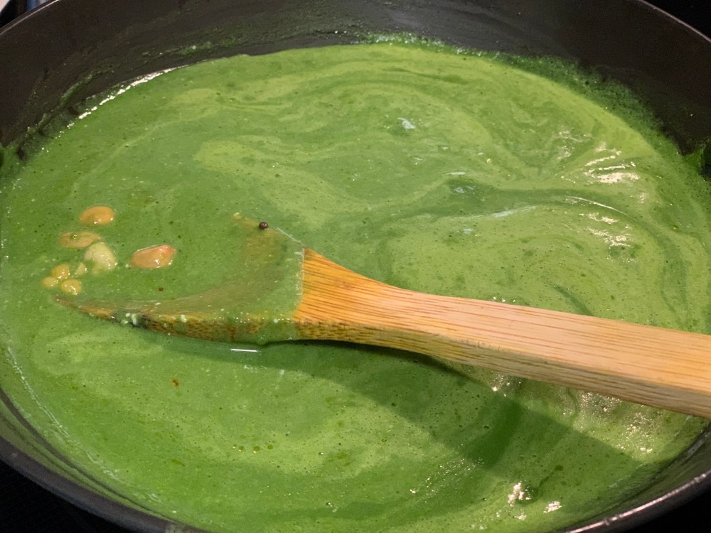 6. Add peanuts, chana dal and the blended mixture. Let it boil.