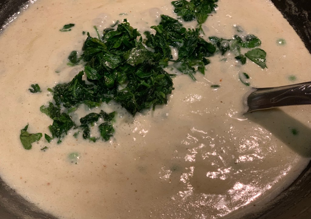 Sautéd fenugreek leaves,  sugar, and salt mixed together.